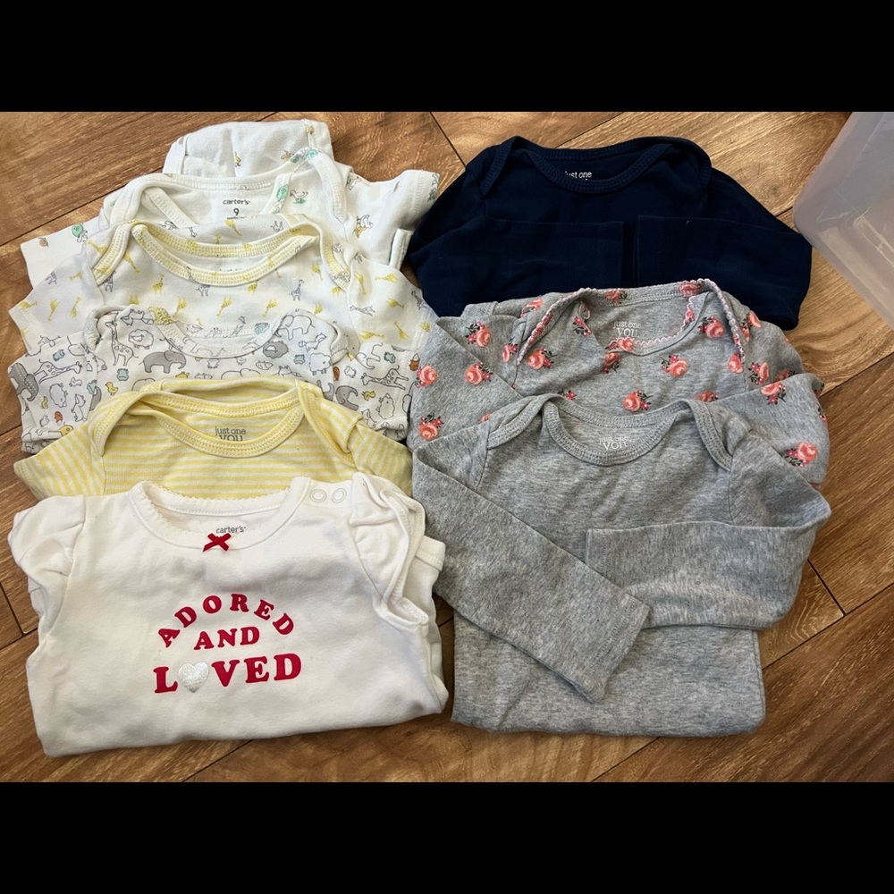 8 gently used baby onsies